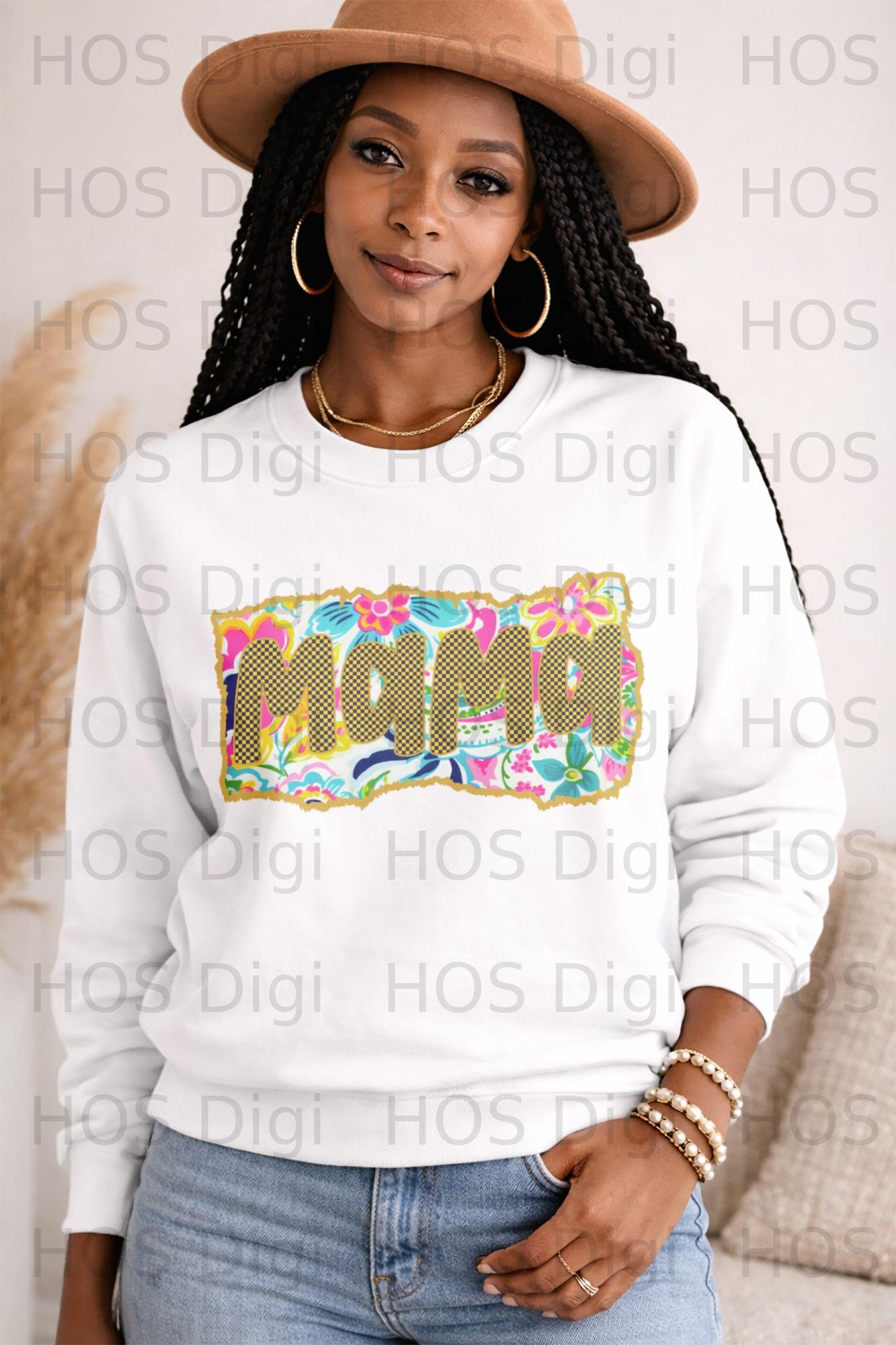 White sweatshirt with colorful "MAMA" text and gold pattern.