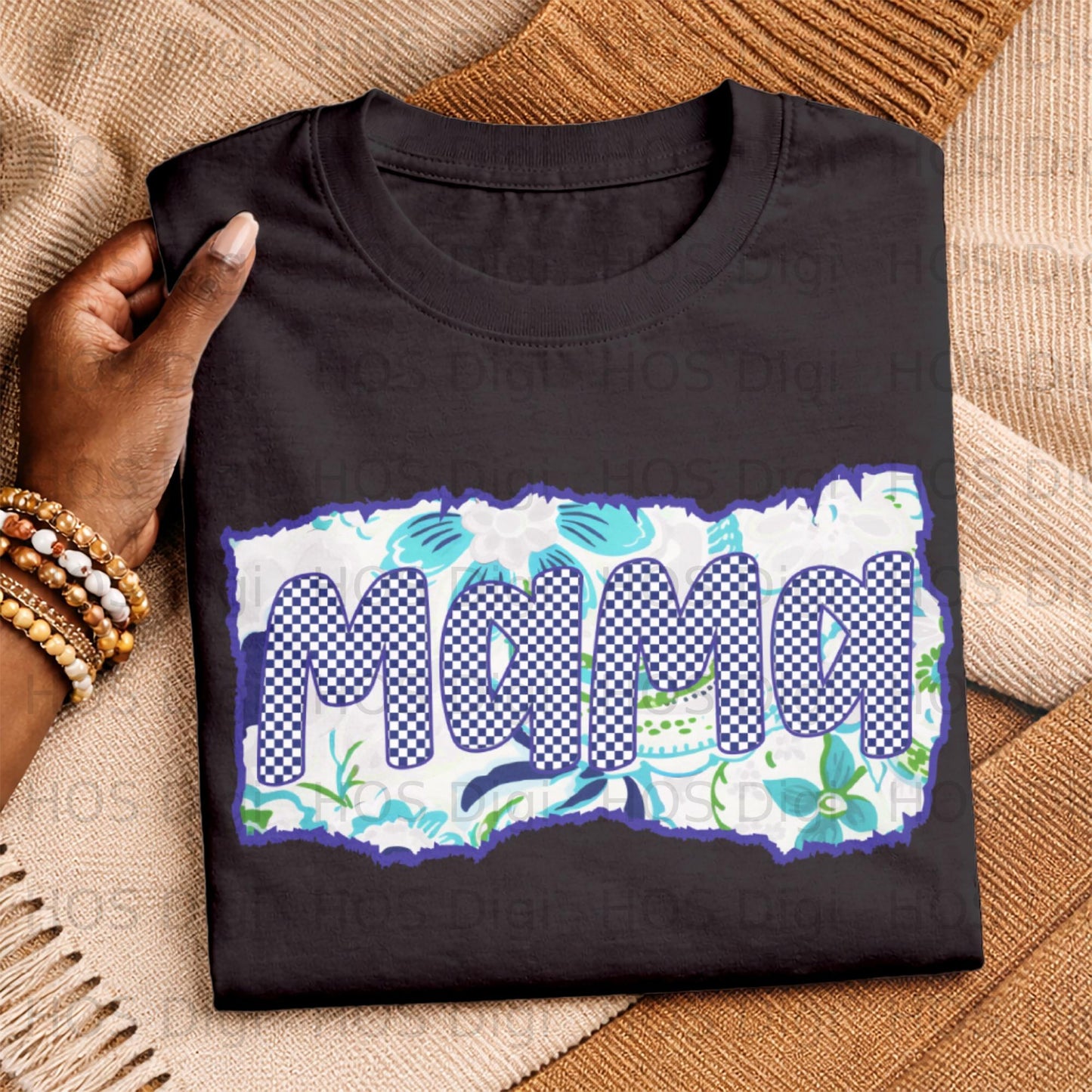 Black t-shirt with blue checkered "Mama" text and floral accents.