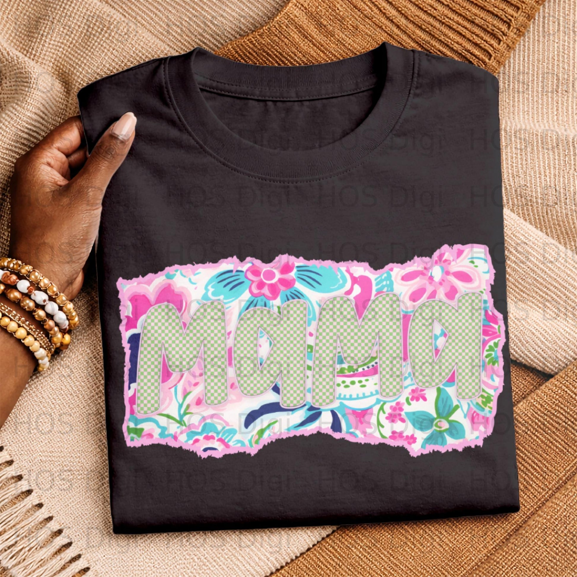 Black t-shirt with "Mama" text in a floral and checkered pattern.