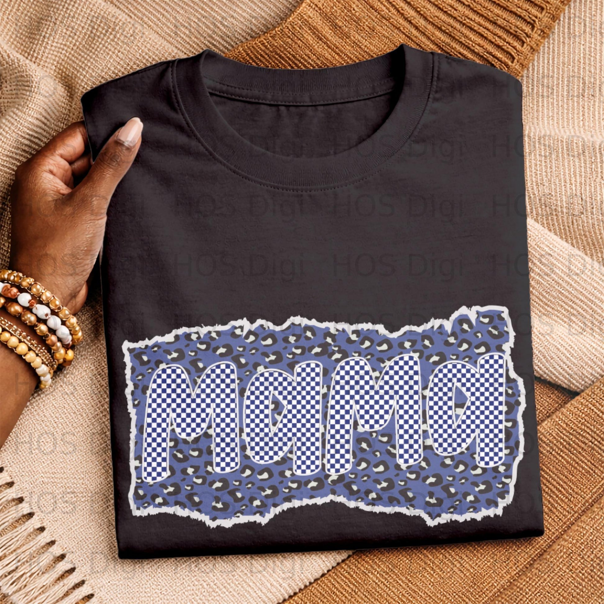 Black t-shirt with "Mama" in a blue and white checkered pattern and leopard print.