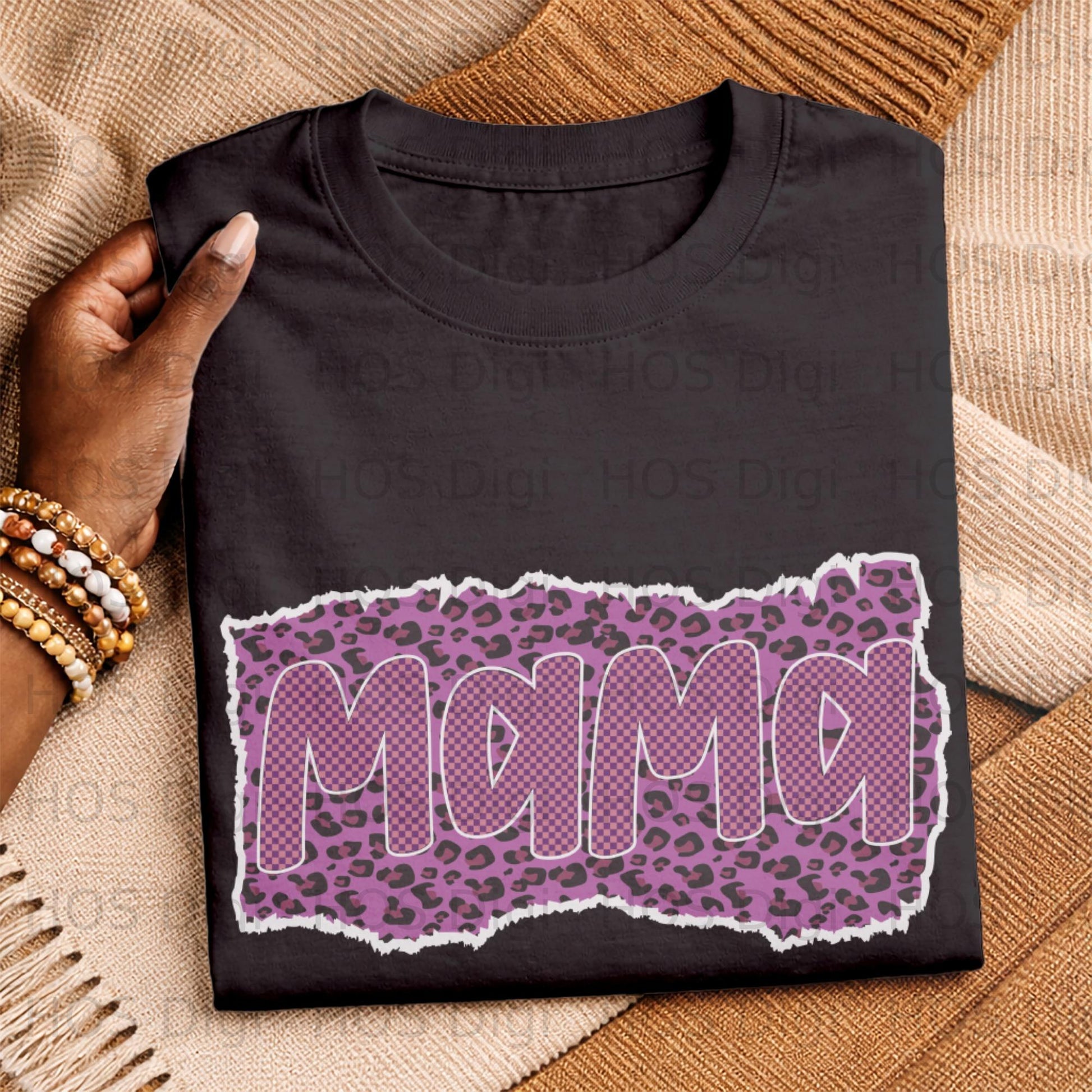 Black t-shirt with "Mama" graphic in purple gingham pattern on ripped paper.