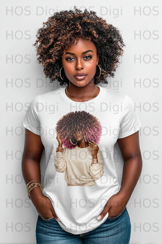 Woman with curly hair wearing a white t-shirt and jewelry.