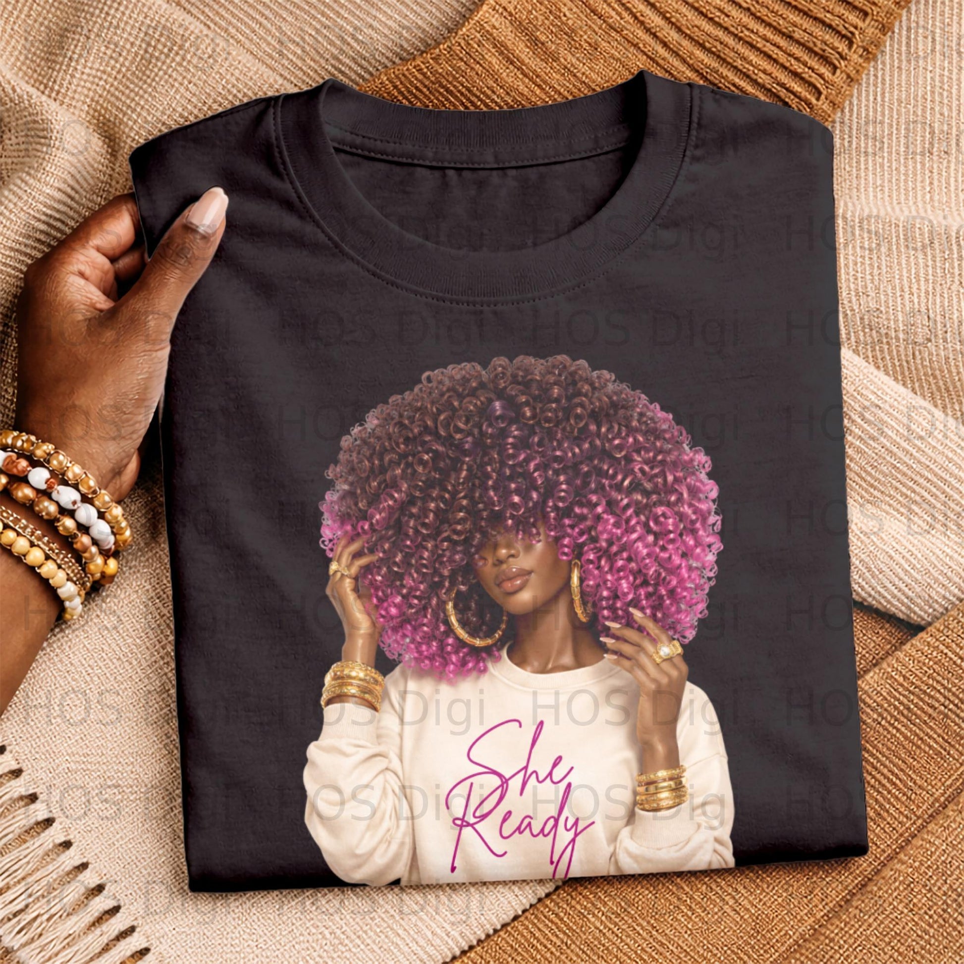 Woman with large pink and brown afro wearing gold jewelry, text "She Ready".
