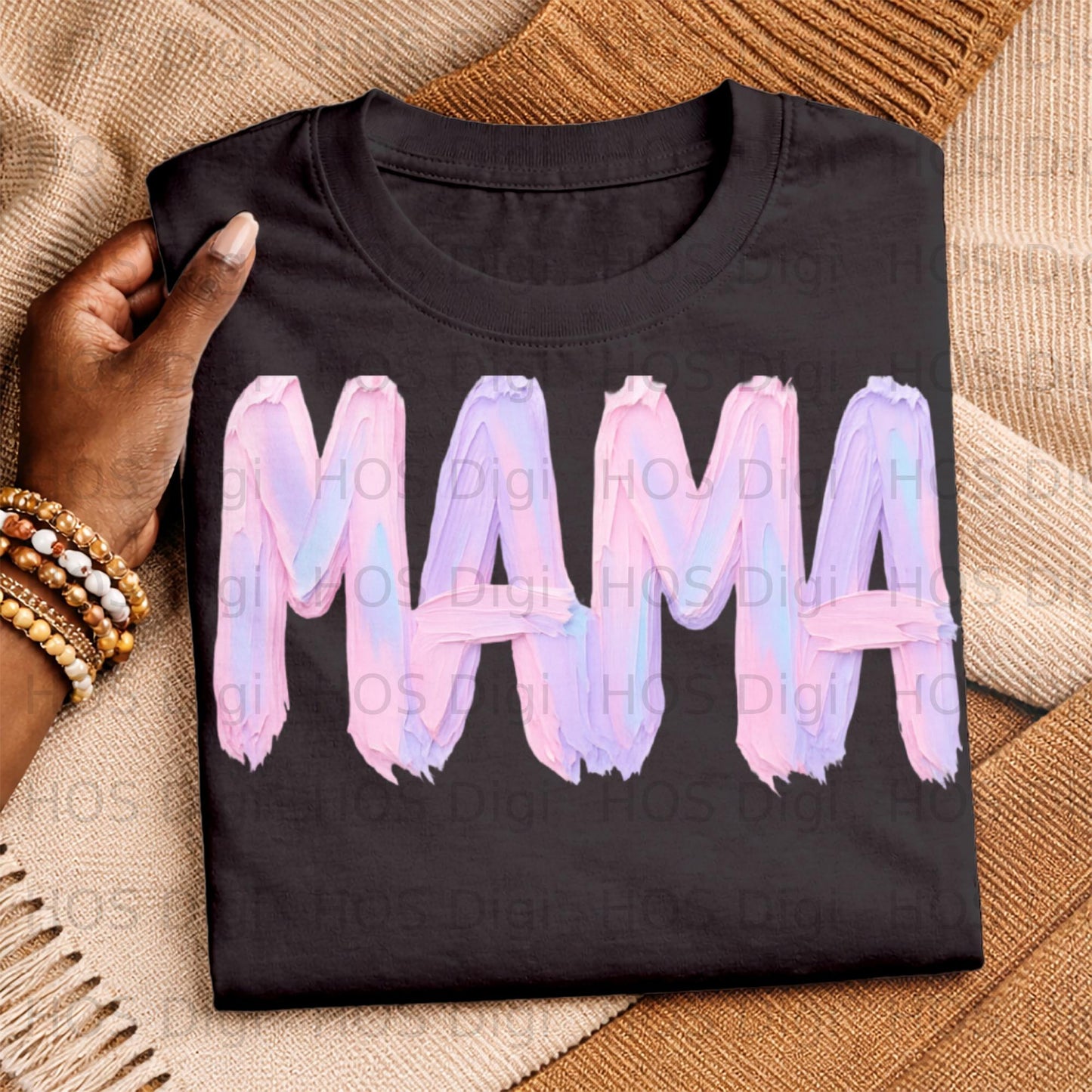 Black t-shirt with "MAMA" in watercolor brushstroke letters.