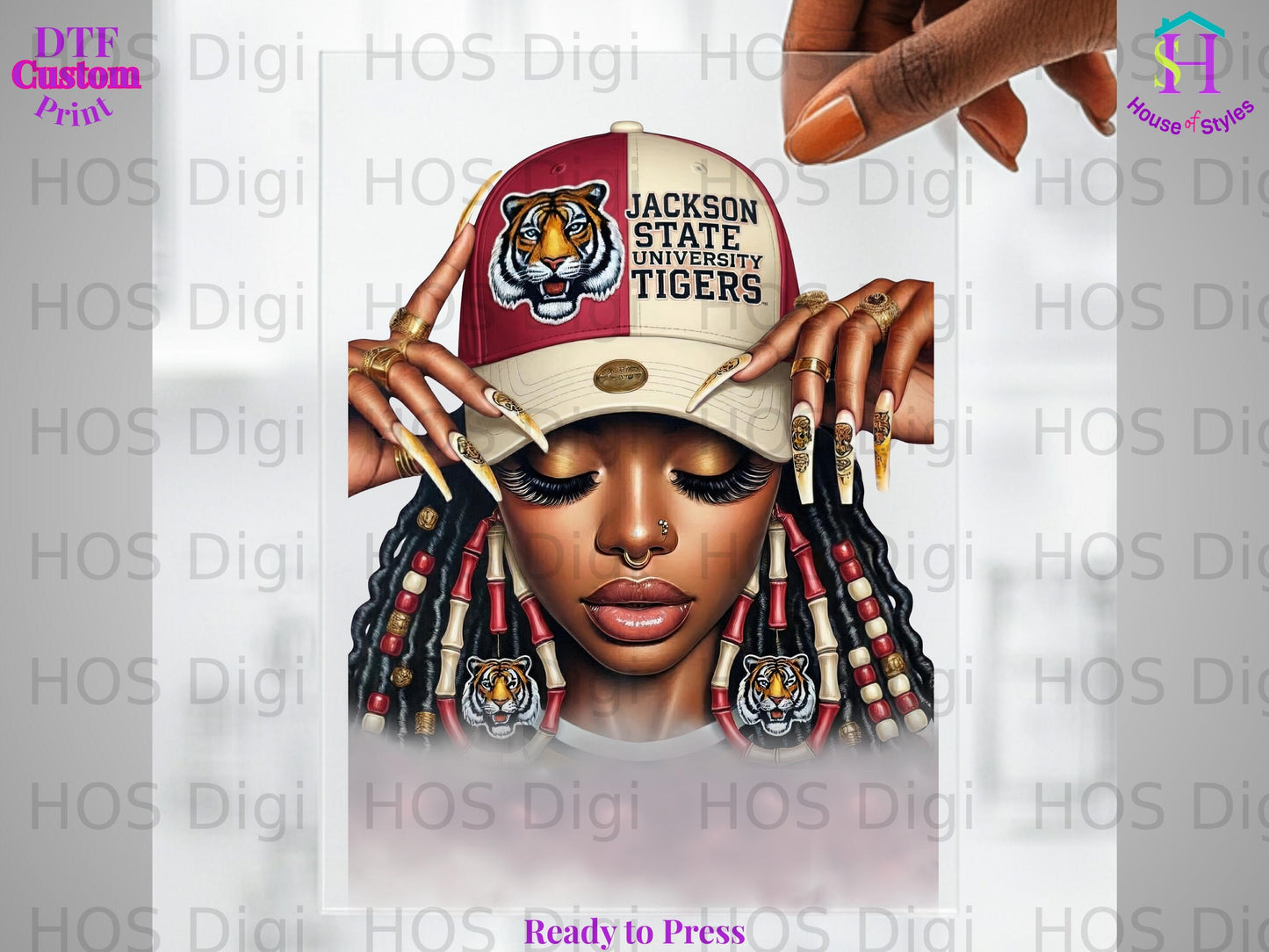 Woman wearing Jackson State Tigers baseball cap and elaborate fingernails.